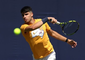 French Open champion Alcaraz eager to take clay form into grass season