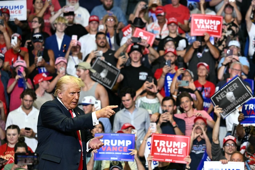 News24 | 'I took a bullet for democracy,' Trump tells first rally since shooting