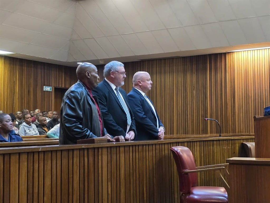 Linda Mti with Patrick Gillingham and Andries van Tonder at the Gauteng High Court in Pretoria. (Belinda Pheto/News24)