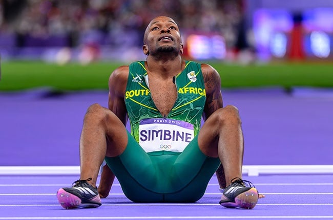 South African sprinter Akani Simbine looks dejected after the 100m at Paris Olympics. (Anton Geyser/Gallo Images)