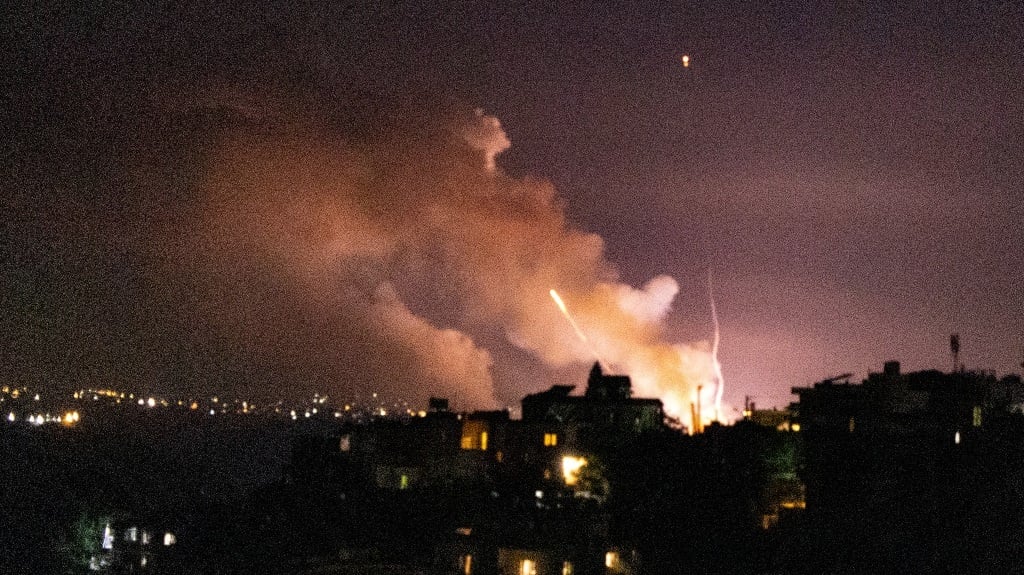 Smoke rises following an Israeli strike on a targe