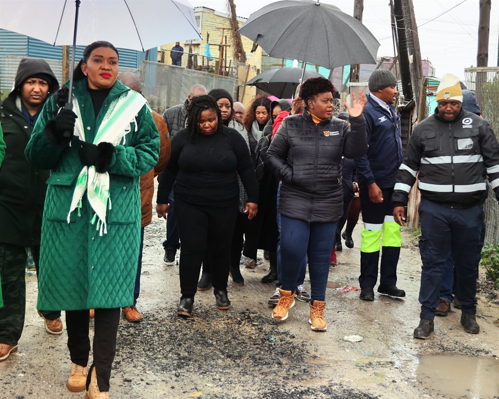 Minister Mmamoloko Kubayi led a delegation to assess the progress of interventions for families affected by gale-force winds and heavy rains in Khayelitsha. (@The_DHS/X, formerly Twitter)