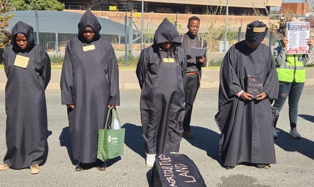 News24 | Protesters march with coffin in Sandton against proposed coal mines