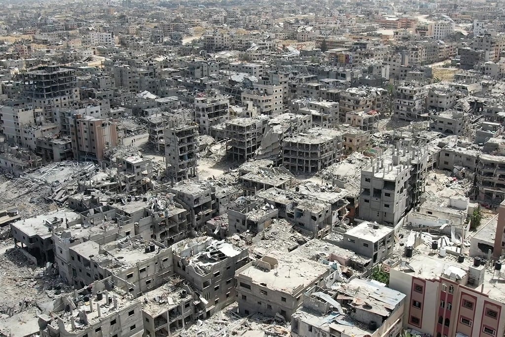 This video grab from AFPTV shows an aerial view of destroyed buildings in Khan Yunis in the southern Gaza Strip on 22 April 2024 amid the ongoing conflict in the Palestinian territory between Israel and them militant group Hamas. (AFPTV/AFP)