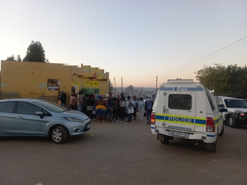 News24 | Diepsloot residents camp outside tuck shop as owner is held for allegedly raping six-year-old girl