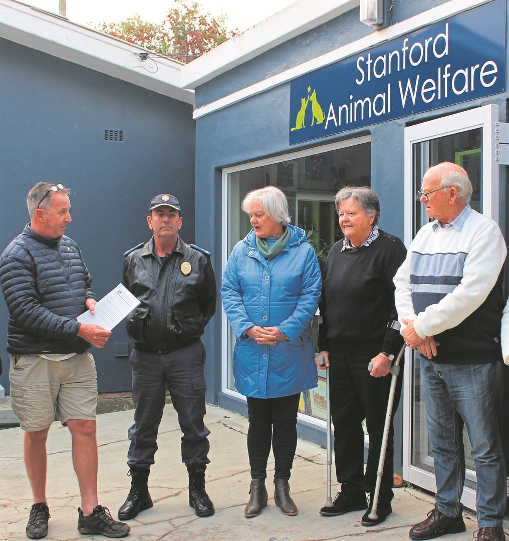 CPF chairperson Kevin Husk, Chief Johan du Toit (Overstrand Law Enforcement), Mayor Dr Annelie Rabie, SAWS member Wendy Hanson and Ward Councillor Dudley Coetzee with the animal-rights petition.Photo: Nelly Roodt