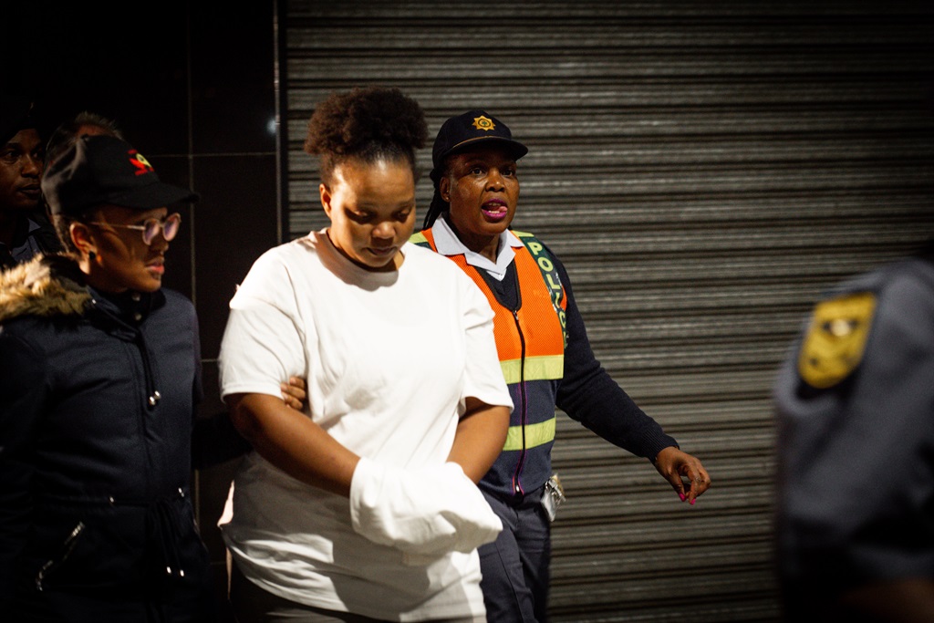 Former Free State premier Ace Magashule's ex-PA Moroadi Cholota arriving at OR Tambo International airport following her extradition. (Alfonso Nqunjana/News24)