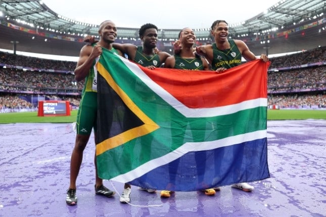 (From left to right) South Africa's 4x100m men’s relay team of Akani Simbine, Bradely Nkoana, Bayanda Walaza, and Shaun Maswanganyi won a silver medal in the final at the Stade de France. (Michael Steele/Getty Images) 