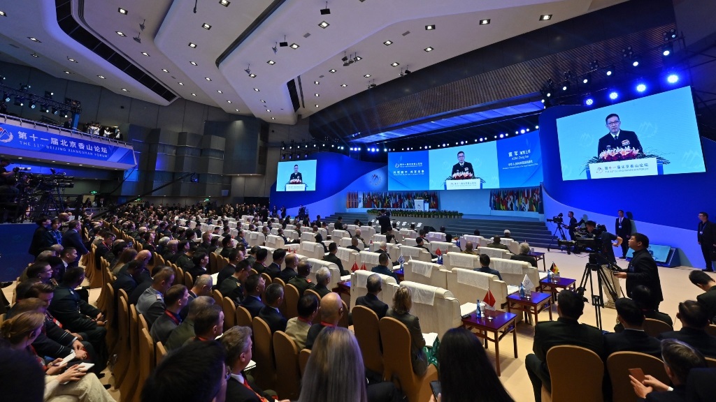 Delegates listen to China's Defence Minister Dong 