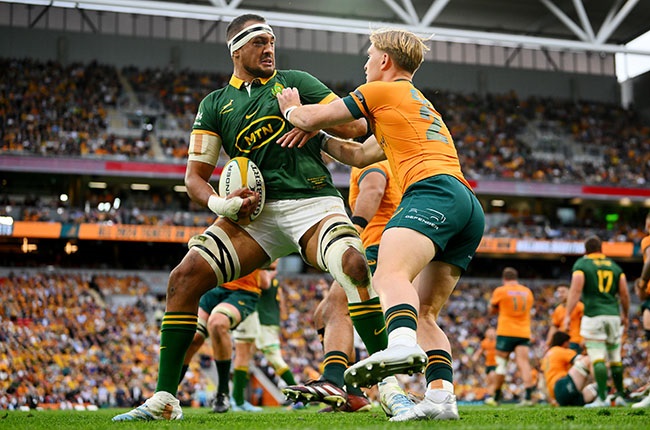 Salmaan Moerat (left), seen here in action against Wallabies scrumhalf Tate McDermott last weekend, will captain the Springboks on Saturday (Photo by Morgan Hancock/Getty Images)