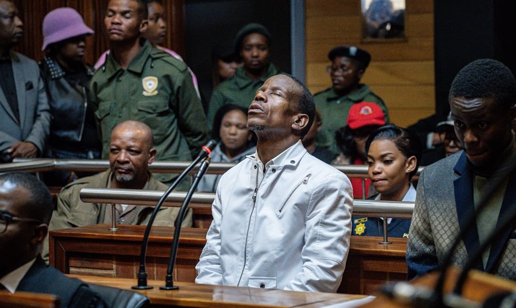 Paseka "Pastor Mboro" Motsoeneng praying during a bail hearing at Palm Ridge Magistrate Court. (Alfonso Nqunjana/News24)