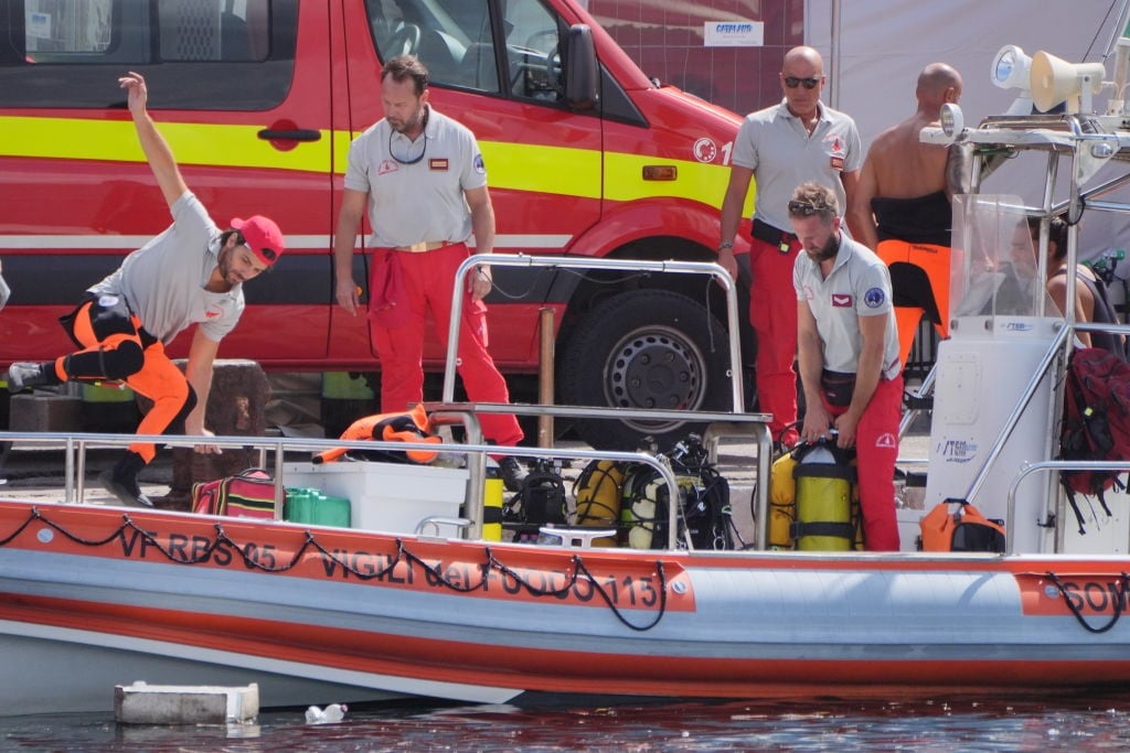 Italian emergency services prepare to head toward the area off the Sicilian coast where the search continues for British technology tycoon Mike Lynch and his daughter Hannah, who are among six tourists missing after a luxury yacht sank in a tornado off the coast of Sicily.  (Photo by Jonathan Brady/PA Images via Getty Images)
