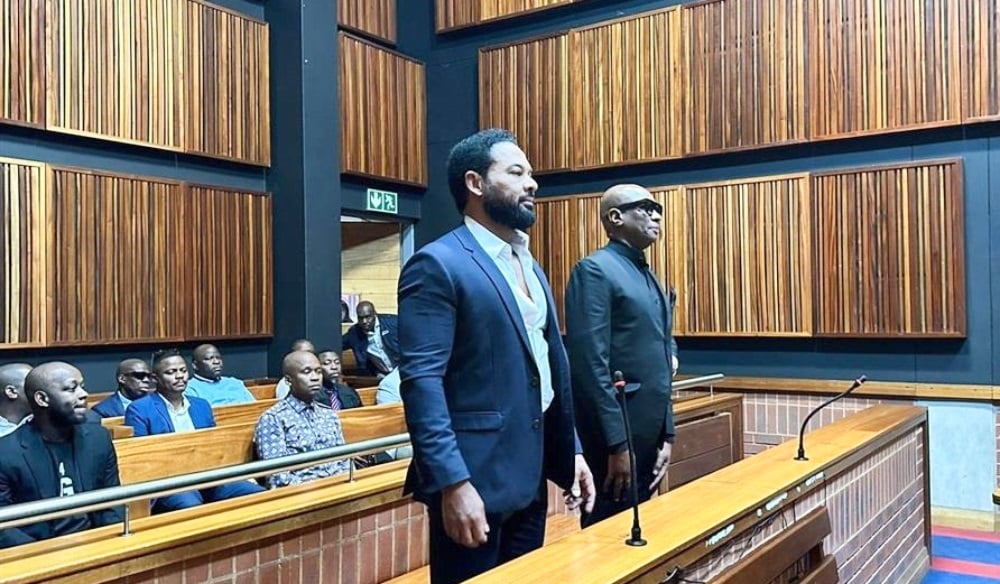 Former EOH executive Jehan Mackay and his co-accused, former sport, arts and culture minister Zizi Kodwa. (Iavan Pijoos/News24)