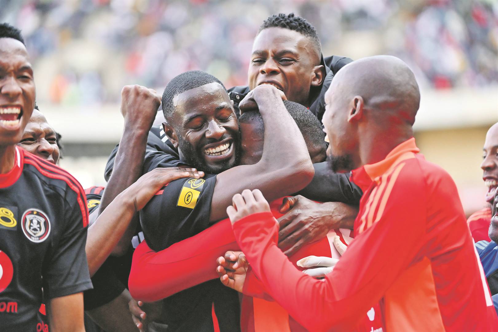 Deon Hotto of Orlando Pirates celebrates with his team-mates after scoring a wonder of a free-kick that left Cape Town City goakeeper Darren Keet unmoved.  goal during the MTN8, semifnal against Cape Town City at the Orlando Stadium yesterday PHOTO: 