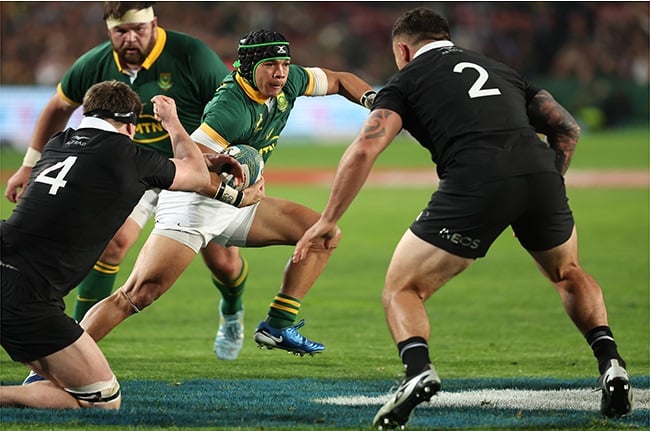 Cheslin Kolbe, seen here after he bounced New Zealand's lock and captain Scott Barrett, is an important cog to the Bok cause. (Johan Orton/Gallo Images)