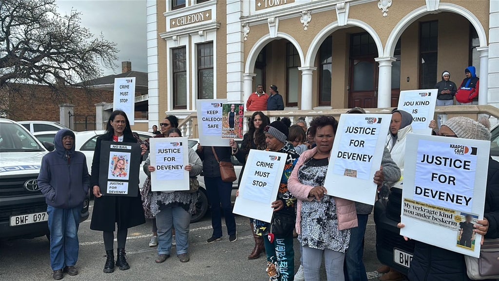 Caledon residents protest outside the Caledon Magistrate's Court on Wednesday. (Marvin Charles/News24 