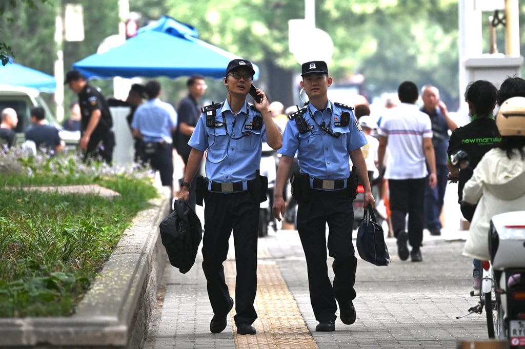 A 10-year-old Japanese national living in the southern Chinese city was attacked near a Japanese school on Wednesday and died in the early hours of Thursday morning. (Greg Baker/AFP)