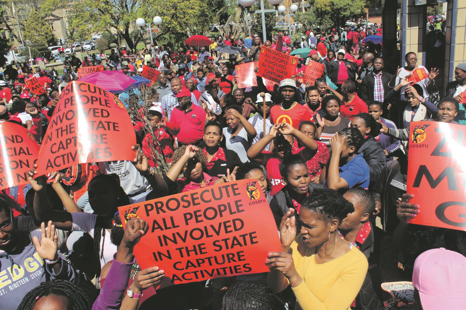 A sea of red fills the streets of Mthatha as Cosatu workers strike. The question remains as to union apathy in the face of state capture. Photo: Ziyanda Zweeni