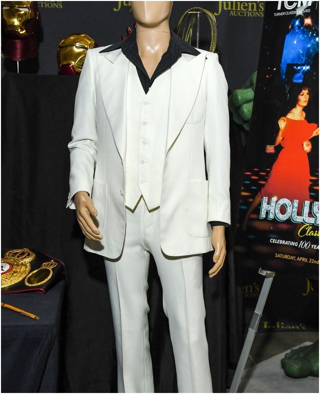 John Travolta's iconic white Saturday Night Fever suit sells for nearly R5  million – sweat marks and all | You
