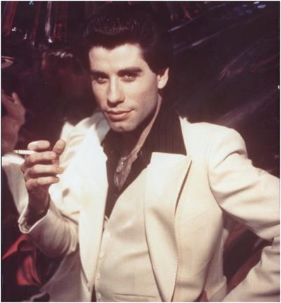 John Travolta’s iconic white Saturday Night Fever suit sells for nearly ...