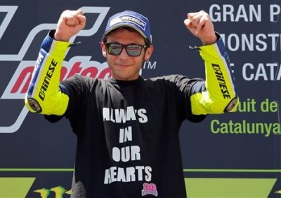 <b>GREAT WIN FOR ROSSI:</b> Valentino Rossi celebrates on the podium after winning the Catalunya Motorcycle Grand Prix at the Barcelona Catalunya racetrack in Montmelo, Spain. <i>Image: AP / Manu Fernandez</i>