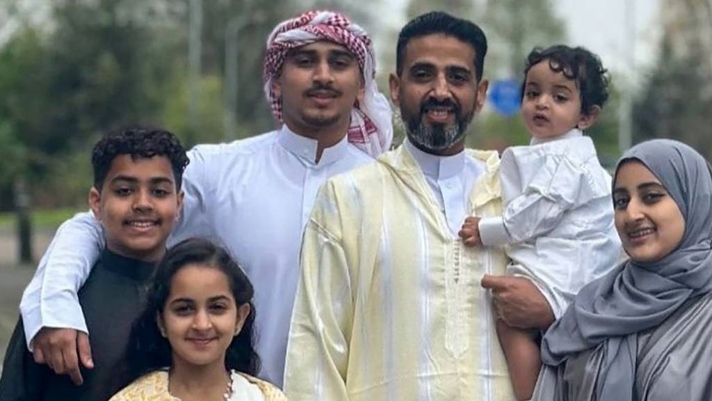 A family handout picture shows Dutch-Yemeni citizen Fahd Ramadhan (C) with his children in Zaandam in 2023. (Family handout/AFP)