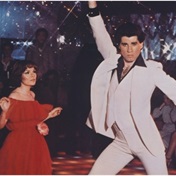 John Travolta’s iconic white Saturday Night Fever suit sells for nearly R5 million – sweat marks and all