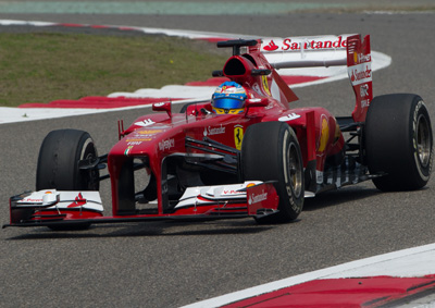 < B>TAKING BACK:</B> Ferrari's Fernando Alonso set the fastest time in the final practise for the China GP in Shanghai on Saturday, April 13. <i>IMAGE: AFP</i>