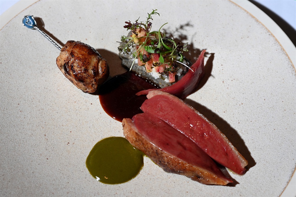 Venezuelan chef Ricardo Chaneton's Racan pigeon dish at his Michelin Star restaurant "Mono" in Hong Kong. For Chaneton, who for so long was known for French cuisine, getting the star two years after his restaurant Mono's opening is a source of great pride -- as well as a "very nice weight" of responsibility. (Peter PARKS / AFP)