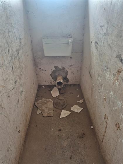 Vandalised and stolen toilets in Van Coller Primary School in the Eastern Cape. Photo by Tembile Sgqolana
