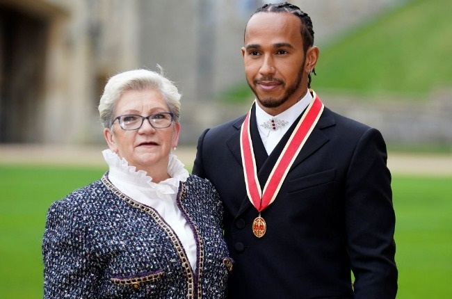 Lewis Hamilton’s mom, Carmen Larbalestier, beamed when the British F1 star was knighted by Prince Charles. (PHOTO: Getty Images) 