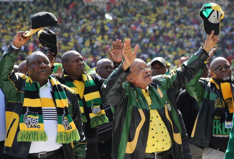 President Jacob Zuma waves to his supporters as he arrives for the Siyanqoba rally. Picture: Siphiwe Sibeko/Reuters