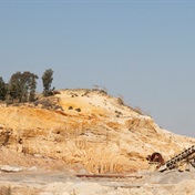 The race for gold in Joburg's giant mine dumps