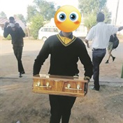 PICS: Kid rocks up with a COFFIN at school! 
