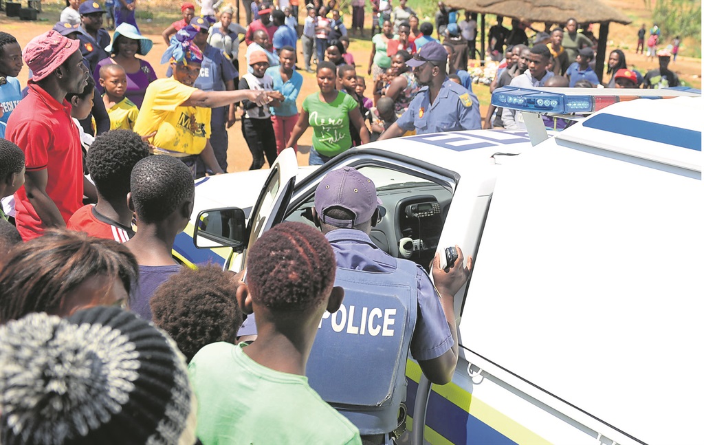 Eldorado Park cops had their hands full when Freedom Park residents stoned a police van that rescued two fake Eskom employees who tried to rob a tavern at the weekend.                                                Photo by Lucky Morajane   