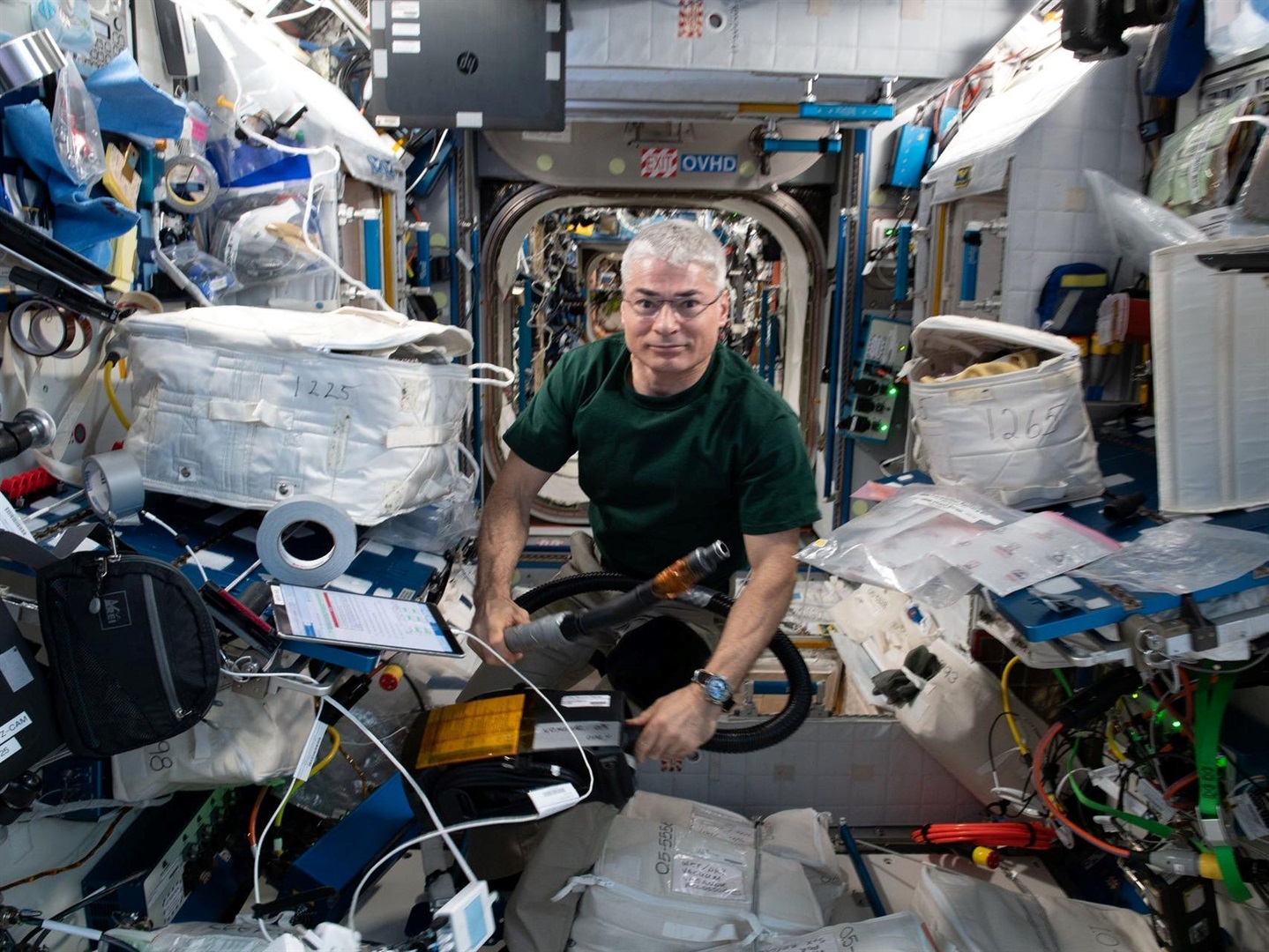 NASA astronaut Mark Vande Hei does maintenance activities inside the International Space Station's Harmony module, June 9, 2021.
