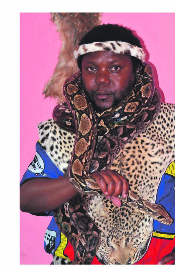 AMADLOZI’S INSTRUCTIONS:Sangoma Sibusiso Ngobese claims he gets powers through  snakes.      Photo by   Lulekwa Mbadamane