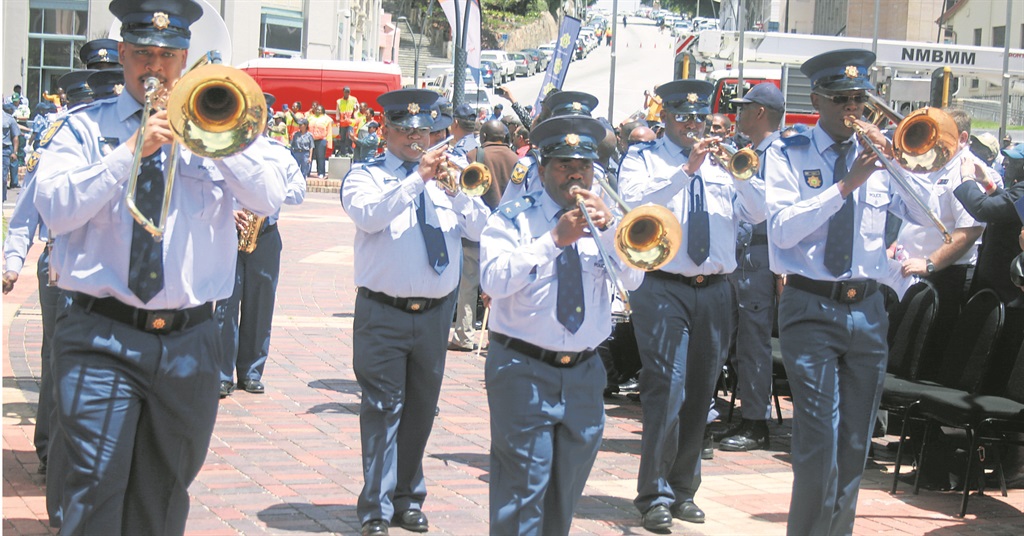 Cops march during a parade in front of the City Hall in Port Elizabeth.  Photo by Godfrey Sigwela. 