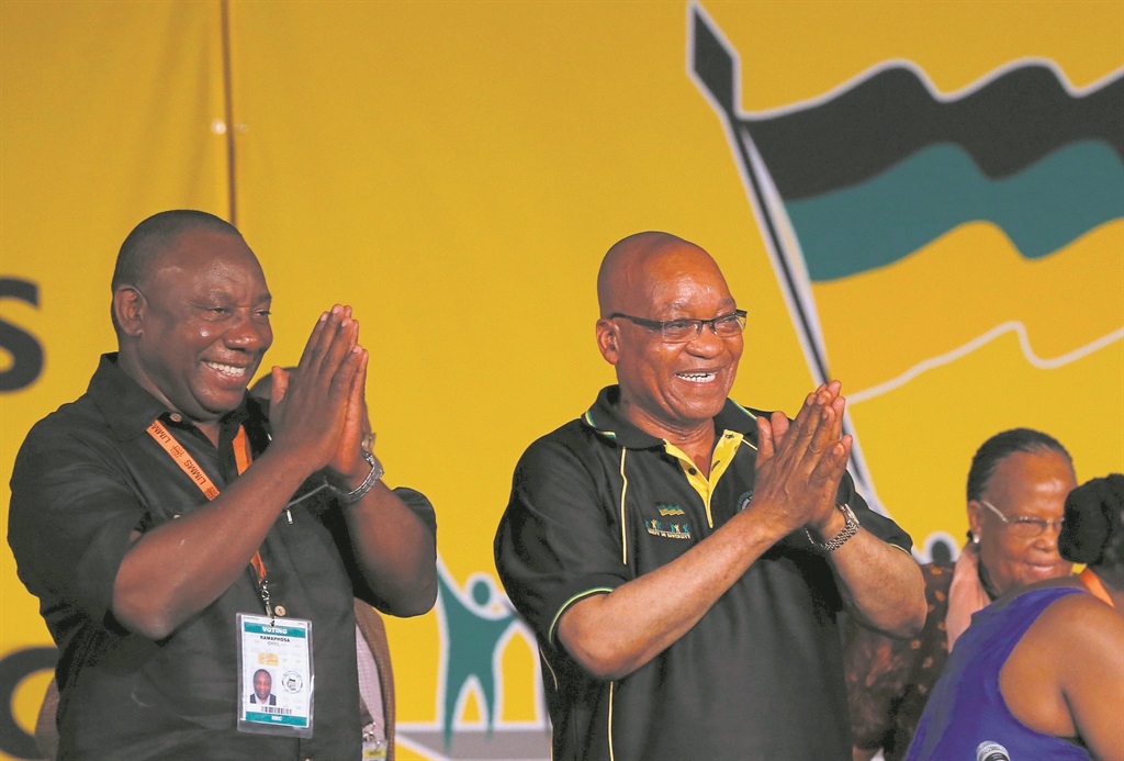 South African President Jacob Zuma with deputy Cyril Ramaphosa.                                                       Photo by Reuters   