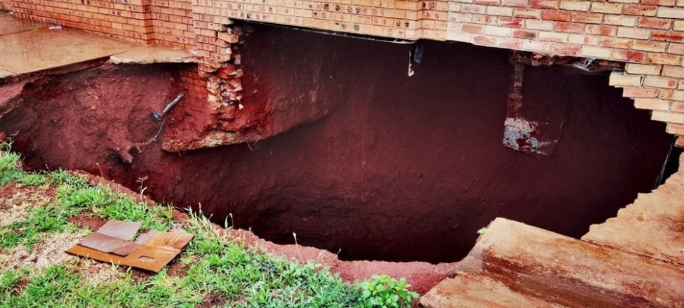 The high school in Khutsong, Carletonville saw part of the school caving in due to a sinkhole in the school yard last Thursday. Pic by Trevor Kunene 