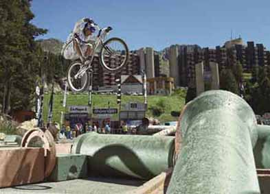 <b>SO, BICYCLES CAN FLY:</b> Nope, not a scene from 'E.T." - one of the exciting sideshows at the Johannesburg International Motor Show will be races between a powered trials bike and a man on a mountain bike. Go see who will win!