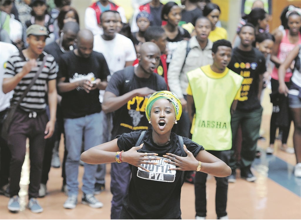 Wits student leader Nompendulo Mkhatshwa (front) leads protesters during the nationwide #FeesMustFall campaign. Picture: Felix Dlangamandla 
