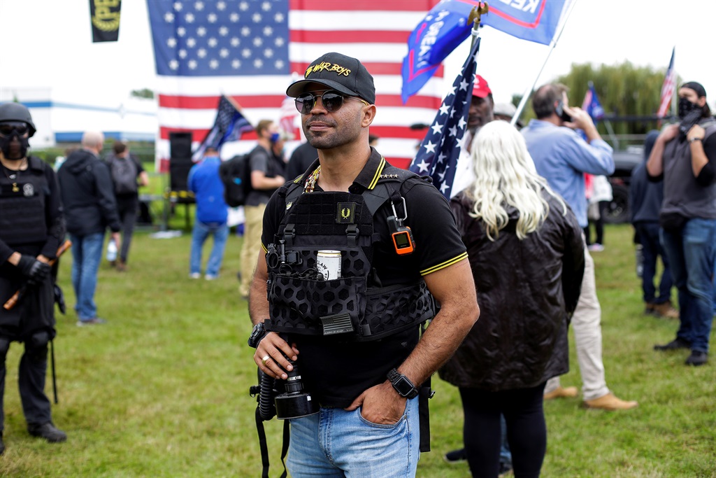 Proud Boys chairman Enrique Tarrio (C) poses for a portrait at Delta Park during a rally on September 26, 2020 in Portland, Oregon.  (Photo by Joshua Lott/The Washington Post via Getty Images)