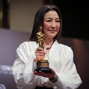 Michelle Yeoh delivers on her promise and takes her Oscar to her mom in Malaysia