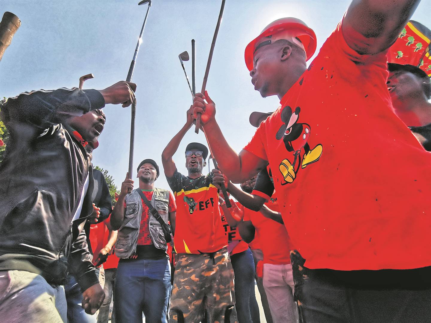 Golf clubs were the weapon of choice when EFF members went with Victor Ramerafe to the cops.        Photo by Christopher Moagi