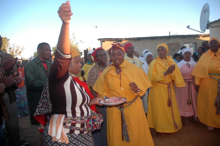 Bishop Phindile Mokoena (left) says the ancestors need to be taken care of so they can return the favour. Photo by Phineas Khoza 