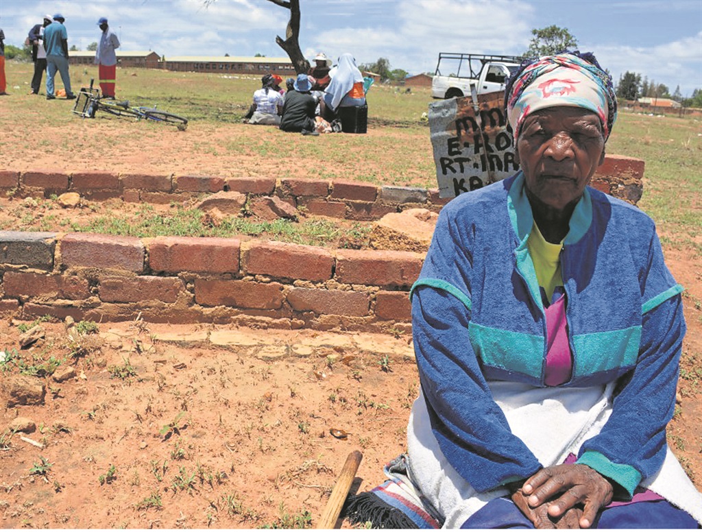 Gogo Anna Moremas says she will do anything to protect her father's grave. Photo by Bongani Mthimunye  