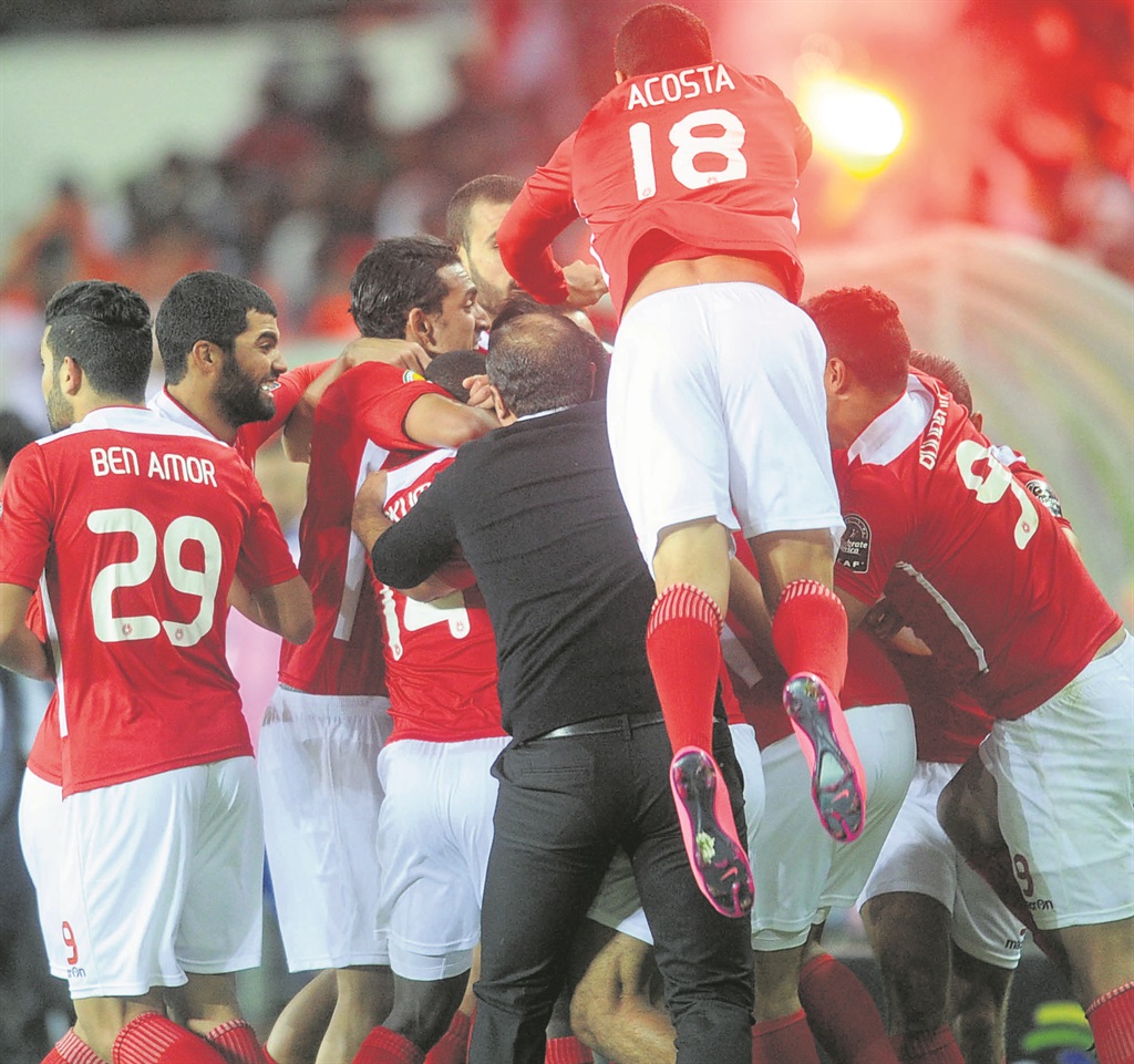 Etoile du Sahel players and staff celebrate their Confed Cup victory over Orlando Pirates yesterday. Photo by BackpagePix 