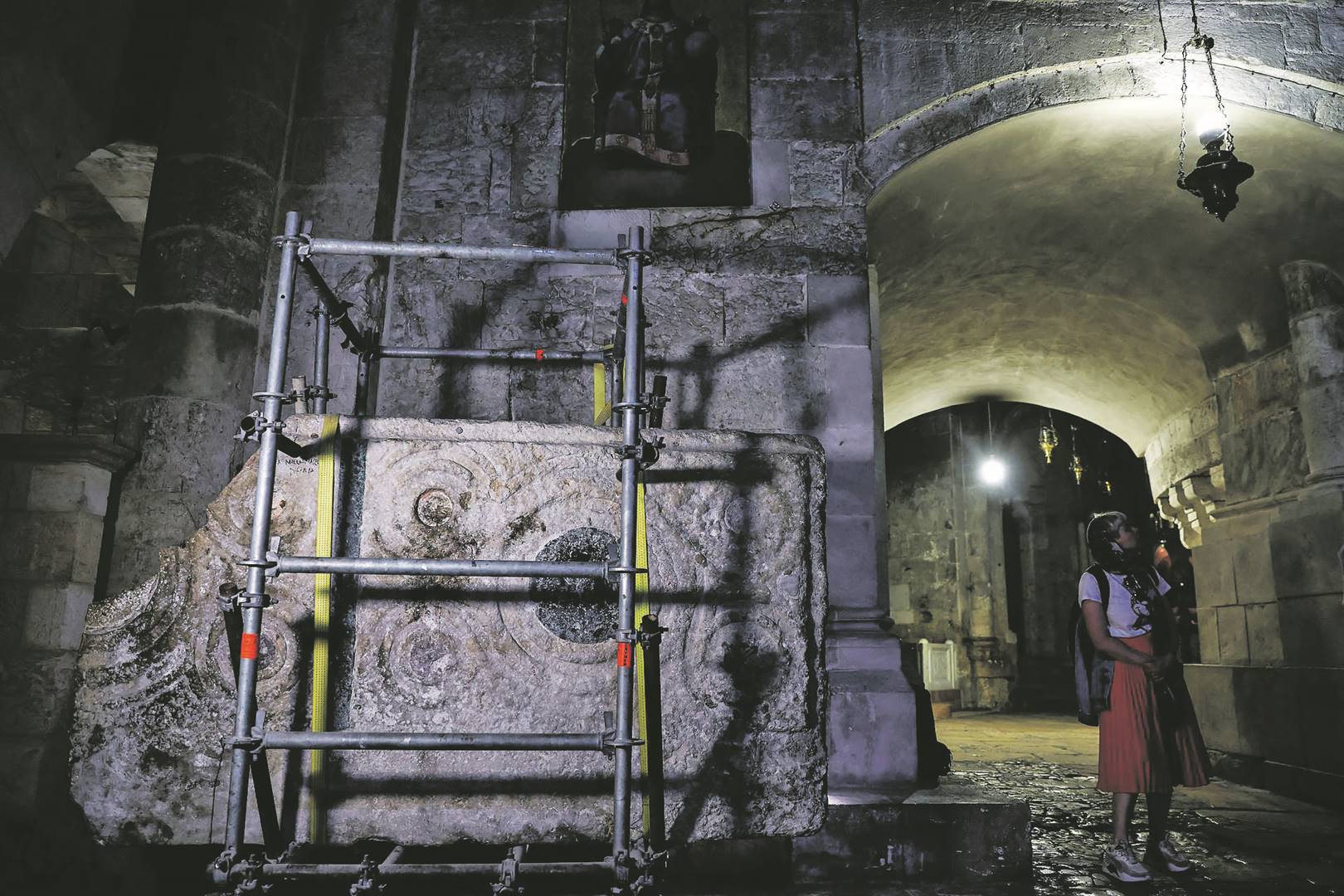  A stone slab said to be the decorated front of the Crusades-era high altar of the Church of the Holy Sepulchre Photo: Ronen Zvulun / reuters