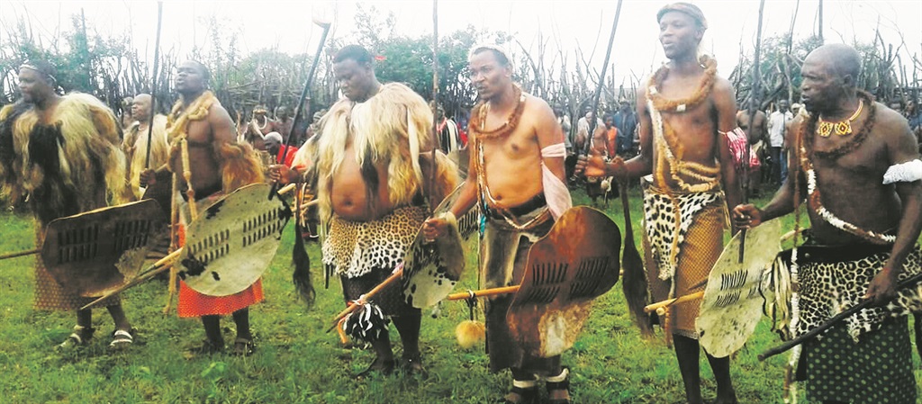 People of the Mngomezulu clan sing traditional songs during their event last Sunday. 